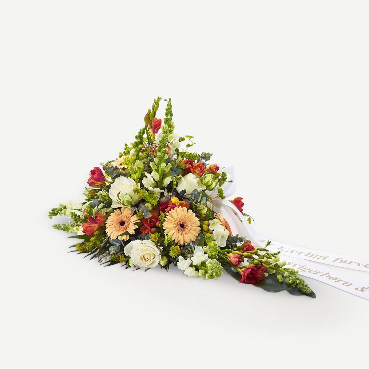 Golden funeral decoration with ribbon