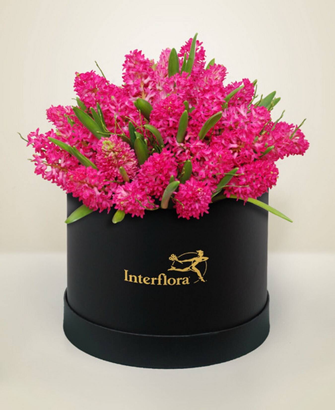 Blumen, Pink, Blumenstrauß, Behälter, Interflora, pinke Blüten, Blumenarrangement, runder Hutbox, Interflora, Blumenbox, blumen, rosa bouquet, Zylinder-Box, arrangierte Blumen, Geschenk-Blumenbox