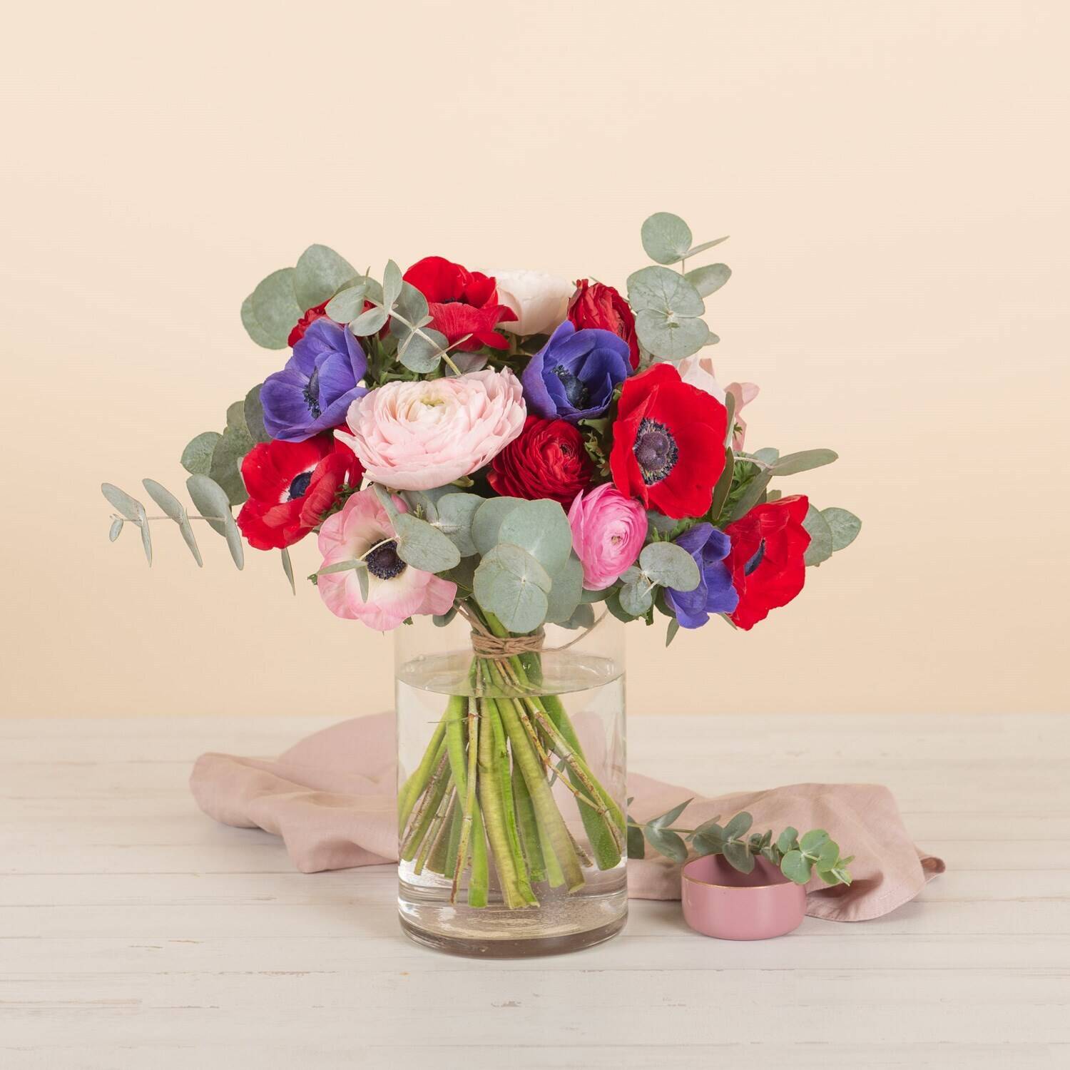 flower bouquet, glass vase, colorful flowers, eucalyptus, stems visible, flowers, bouquet, ranunculus, anemone, eucalyptus, flower bouquet, glass vase, colored flowers, eucalyptus, stems visible