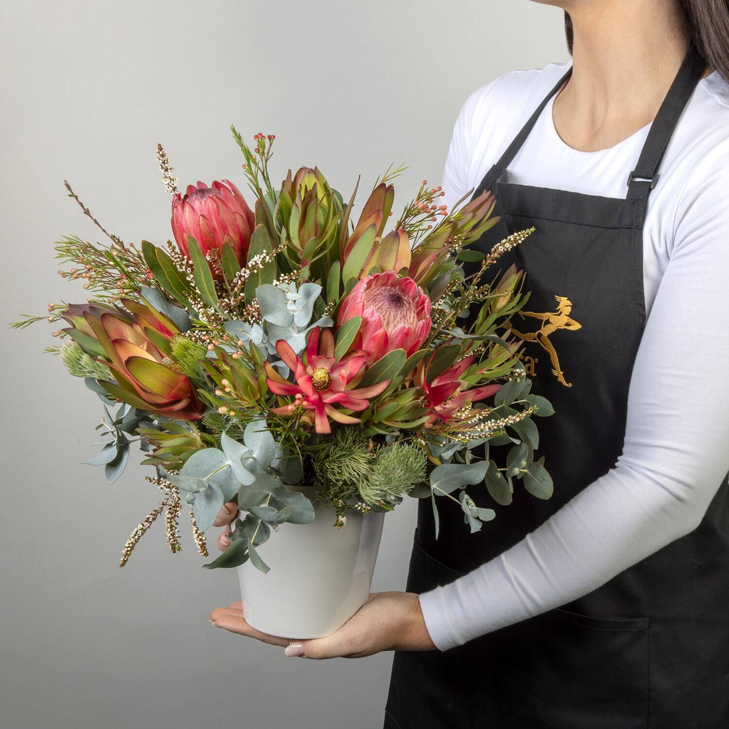flower bouquet, protea, greenery, floral arrangement, pot vase, flower bouquet, pink protea, green foliage, ceramic vase, floral arrangement, flower bouquet, proteas, greenery, ceramic vase, floral arrangement