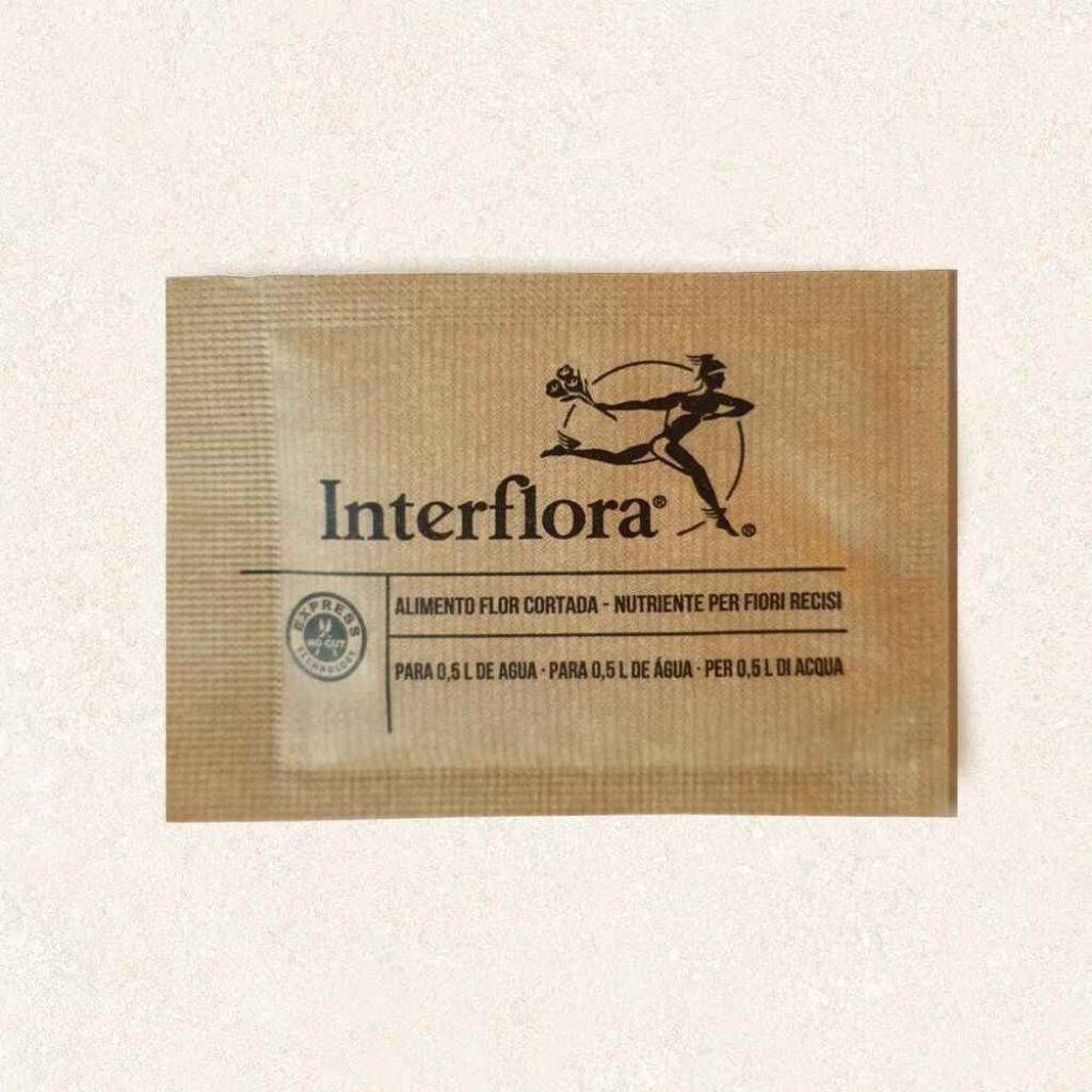 blumennahrung, Interflora, Verpackung, Nährstofflösung, Beutel, dünger, pulver, interflora-etikett, verpackung, braune tüte, pflanzennahrung, dünger, Interflora, Packet, pulver?, fern, interflora, pflanze, samen, verpackung