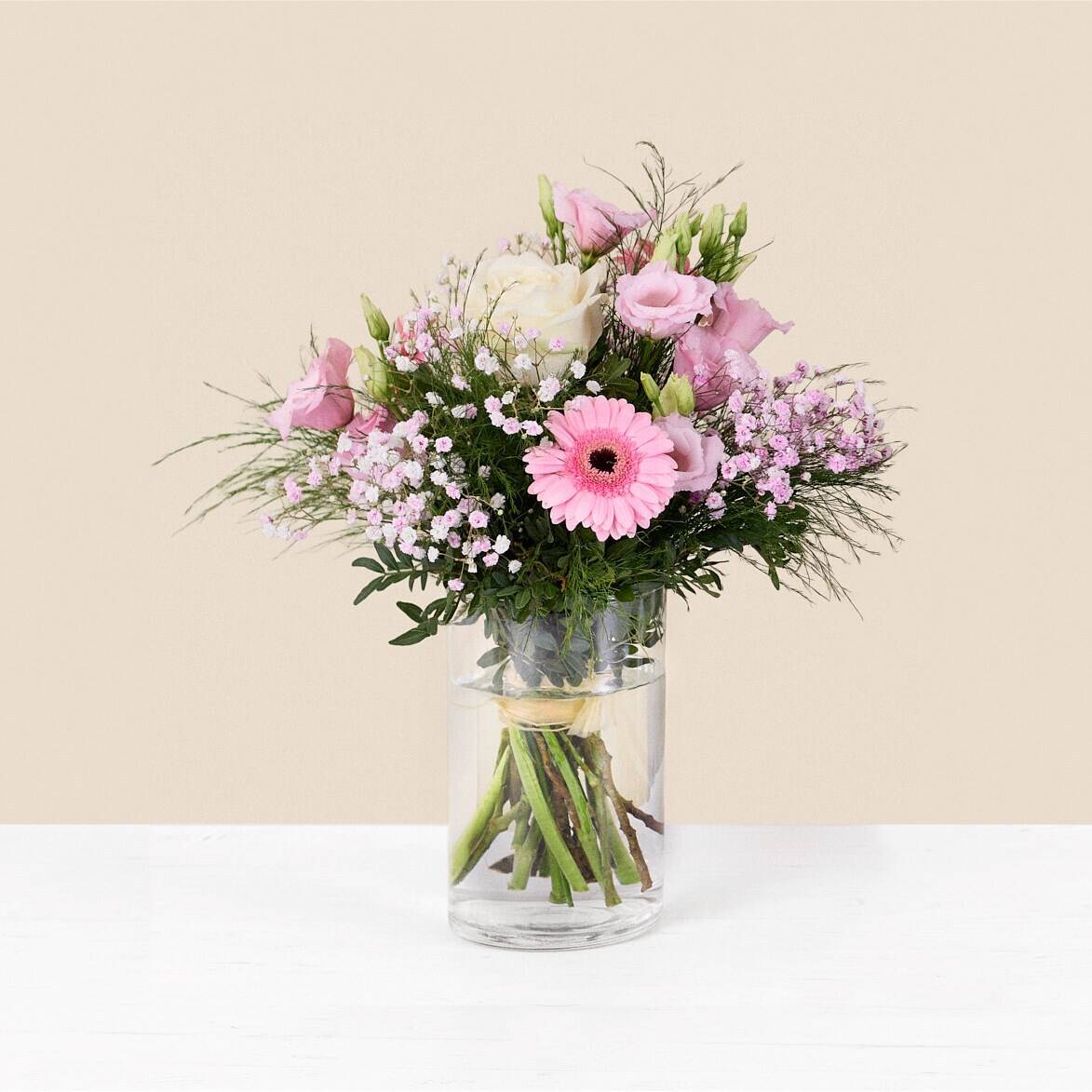 flower bouquet, pink flowers, glass vase, baby's breath, green foliage, flower bouquet, pink flowers, gladiola?, gerbera daisy, glass vase, flower bouquet, pink gerbera, roses, baby’s breath, glass vase