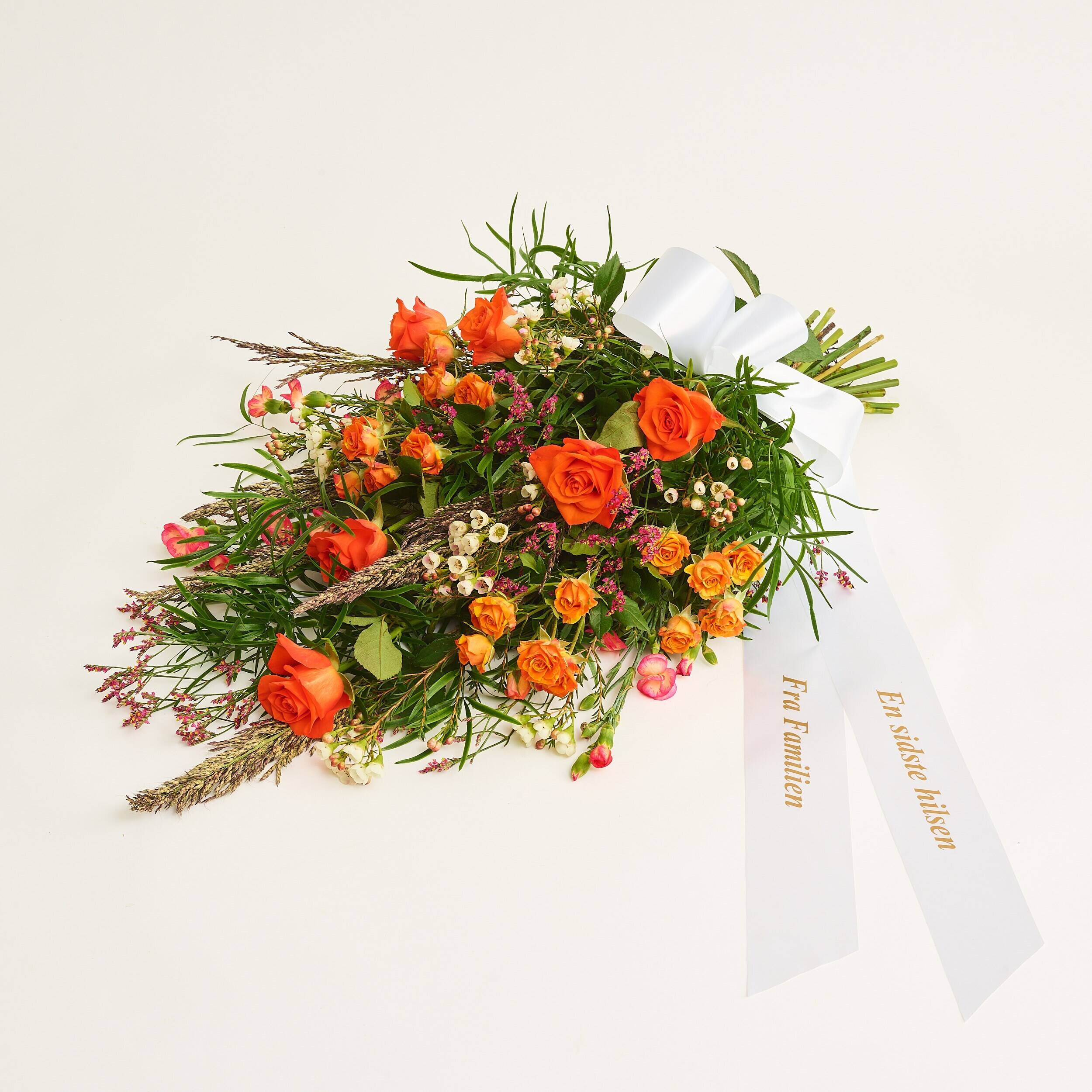 Funeral spray golden with ribbon
