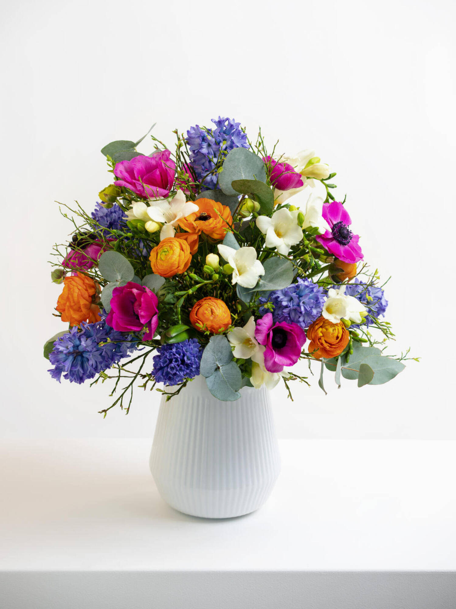 Spring Awakening - Main Colors: VARICOLORED - Main Flowers: FREESIA, HYACINTHS, RANUNCULI