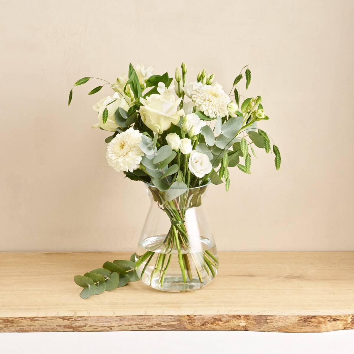 flower bouquet, white flowers, globe eucalyptus, glass vase, green stems